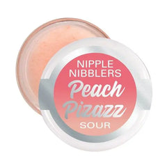 Top-down view of Nipple Nibblers Peach Pizazz balm jar open, showing soft peach-coloured product