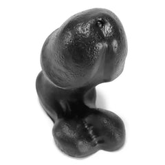 Close-up top-down view of the Oxballs Wrecker Plug revealing detailed surface texture and compact shape
