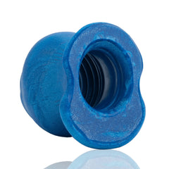 Top-down view of Pig Hole Morph hollow plug revealing ribbed interior channel, platinum silicone