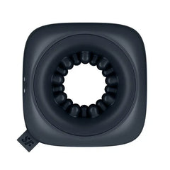 Top-down view of Ring Stroker showing circular beaded texture canal in dark silicone