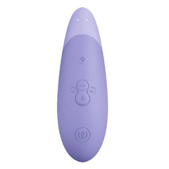 Top-down view of the Womanizer Enhance showing intuitive control buttons on soft silicone body