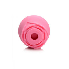Top view of pink silicone rose vibrator showing textured petal design and suction port