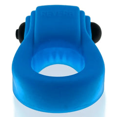 Close-up top view of REVRING's stretchy blue silicone ring and vibe cradle
