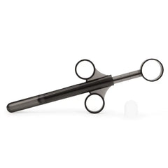 Transparent lube applicator syringe with finger-loop handle and rubber tip cap