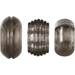 Triple Thick ring set shown flat: ribbed, smooth, and ridged styles in charcoal semi-clear material