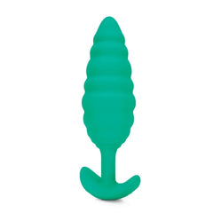 Close-up of Twist plug's graduated ridged texture tapering to a pointed tip in teal silicone