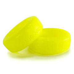 Two acid yellow Oxballs COCK-T silicone cockrings shown side by side, flat base detail visible