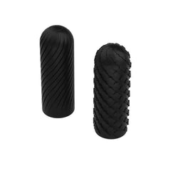 Two Arcwave Ghost stroker sleeves side by side showing spiral and scale exterior textures in black