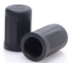 Close-up of two black silicone suction cups showing hollow interior and flexible rim