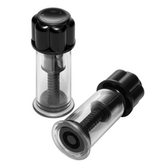 Two clear nipple suction cups with ribbed internal shafts, one upright and one angled to show base seal