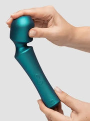 Two hands gently bending the flexible neck of the teal ROMP Presto wand massager