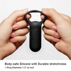 Two hands stretching the body-safe silicone ring showing durable flexibility, 1.2 inch diameter