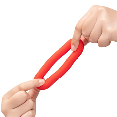 Two hands stretching red silicone ring to show high elasticity and durability
