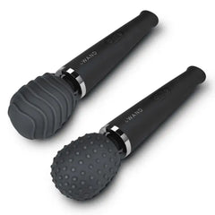 Two le Wand massagers fitted with charcoal wave and dot silicone texture covers on heads