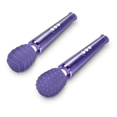 Two purple Le Wand Petite massagers fitted with ribbed and dotted silicone texture covers