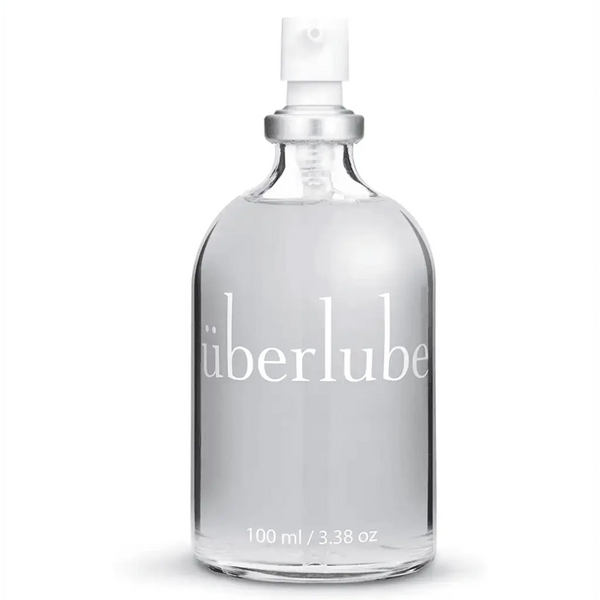 Uberlube Luxury Lubricant in a clear 100ml glass bottle with a pump dispenser