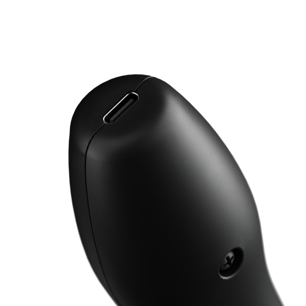 Underside of the Doxy wand head showing USB-C charging port and small screw detail