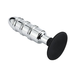 Underside view of Extreme Missile showing spiral ridges along polished steel shaft and flat suction base