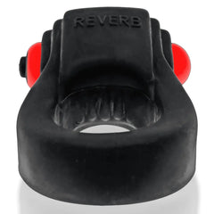 Underside close-up of REVRING showing ribbed inner ring texture and vibe compartment