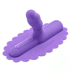 Uni Horn purple silicone dildo attachment angled view showing embossed branding on scalloped base