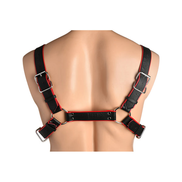 Upper back close-up on mannequin showing shoulder strap crossover and dual silver square buckles