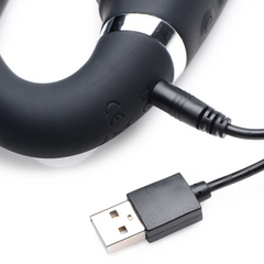 USB magnetic charging cable connected to chrome accent ring port on black silicone strap-on