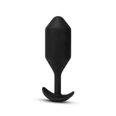 Vibrating Snug Plug 5 slight angle view highlighting smooth matte black silicone finish