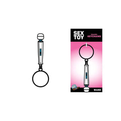 Wand massager keychain shown beside its pink Sex Toy Enamel Keychains retail packaging