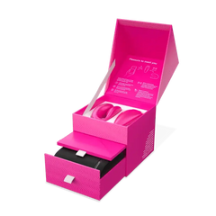 We-Vibe Chorus couples vibrator in open pink gift box with pull-out drawer and USB cable