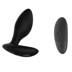 We-Vibe Ditto+ anal plug beside compact wireless remote control, all in black