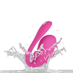 We-Vibe Jive 2 electric pink vibrator splashing in water, demonstrating waterproof capability