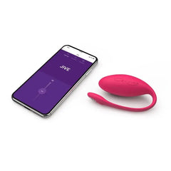 We-Vibe Jive pink vibrator beside smartphone displaying the We-Connect app control interface
