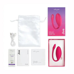 We-Vibe Jive unboxed showing device, satin pouch, USB cable, lube sample, and instruction booklet