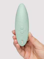 We-Vibe Melt 2 reverse side showing control buttons and magnetic charging port in sage