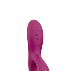 Close-up of We-Vibe Nova 2 control panel with three embossed buttons on fuchsia handle