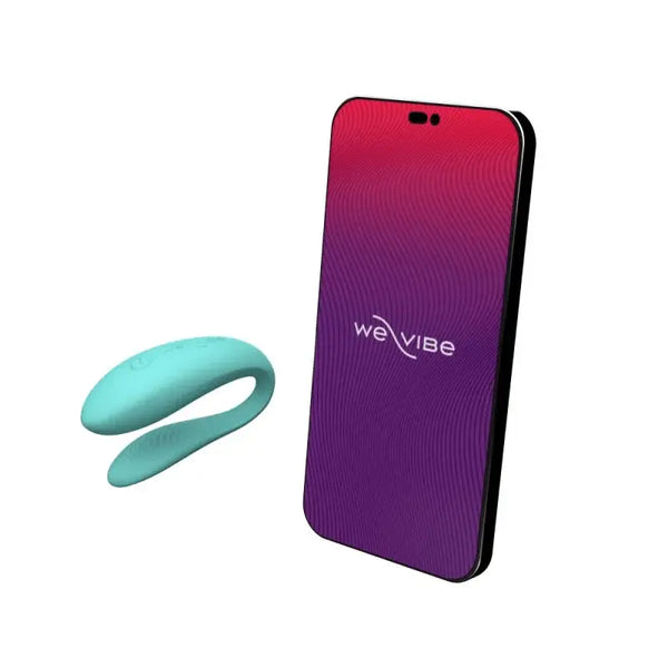 We-Vibe Sync Lite aqua couple's vibrator beside a smartphone displaying the We-Vibe app
