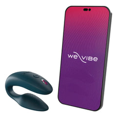 We-Vibe Sync vibrator beside a smartphone showing the We-Vibe app interface