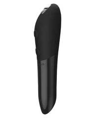 We-Vibe Tango X bullet vibrator side view highlighting slim tapered form and control button