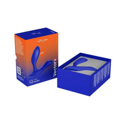 We-Vibe Vector+ prostate massager in blue with product packaging box open beside it