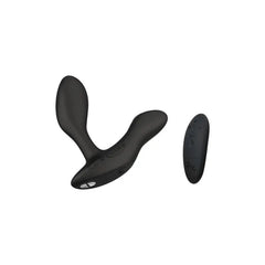 We-Vibe Vector+ prostate massager displayed with included wireless remote control