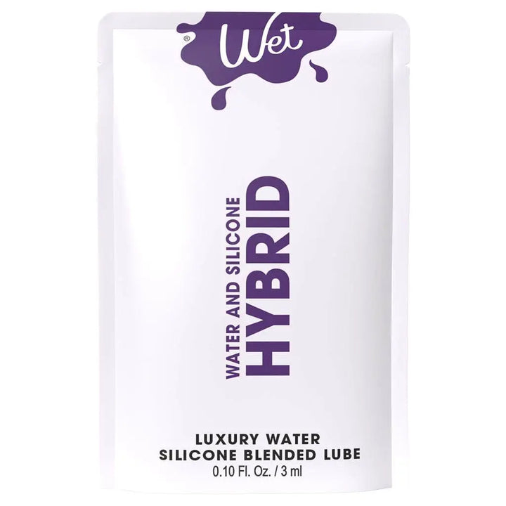 Wet Hybrid Lubricant single-use 3ml foil packet in white and purple