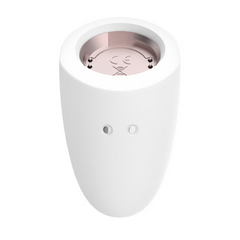 White magnetic charging base of Marvelous Four showing rose-gold connection plate and controls