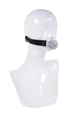 White mannequin head wearing black lace strap ball gag to show fit and silicone ball placement