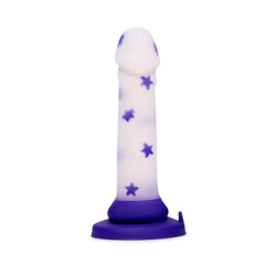 Close-up of white silicone dildo body with raised purple star details and purple suction base