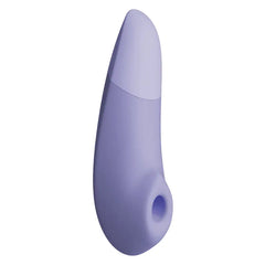 Close-up of the Womanizer Enhance air stimulation opening set into the smooth lilac silicone head