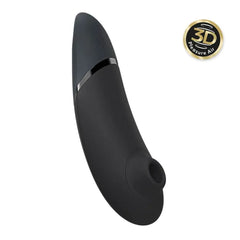 Womanizer Next black silicone clitoral stimulator angled view showing suction opening and sleek curved body