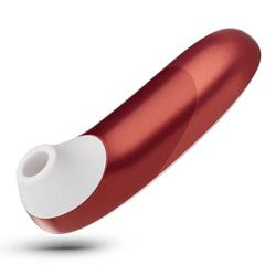 Womanizer Pro bordeaux red stimulator shown at a horizontal angle highlighting its curved ergonomic body