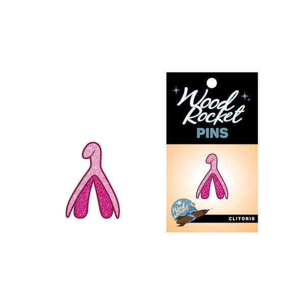 Wood Rocket Clitoris Pin shown beside its black and peach retail card packaging