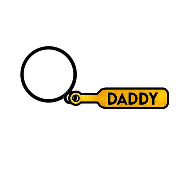 Wood Rocket Daddy Paddle enamel keychain in gold and black on a round metal ring