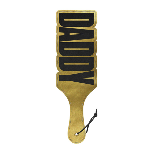 Wood Rocket Daddy Paddle in gold faux leather with bold black letter cutouts
